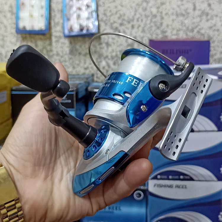 چرخ ماهیگیری 7000 برند دیوزن به همراه نخ مدل FG60 مناسب برای چوب ماهیگیری لنسر ماهیگیری