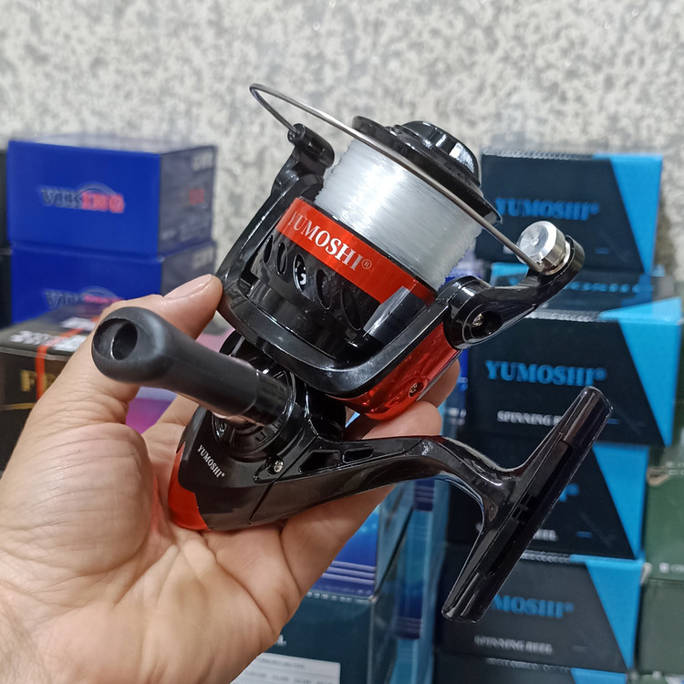 چرخ ماهیگیری 7000 برند یوموشی به همراه نخ مدل FF7000 مناسب برای چوب ماهیگیری لنسر ماهیگیری