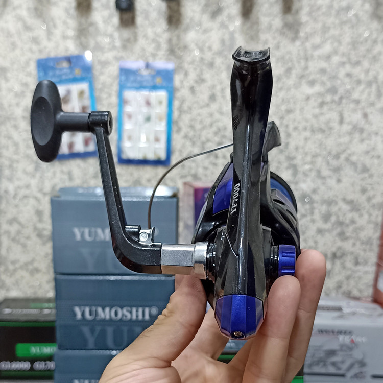 چرخ ماهیگیری 7000 برند یوموشی جیهان به همراه نخ مدل YF7000 مناسب برای چوب ماهیگیری لنسر ماهیگیری