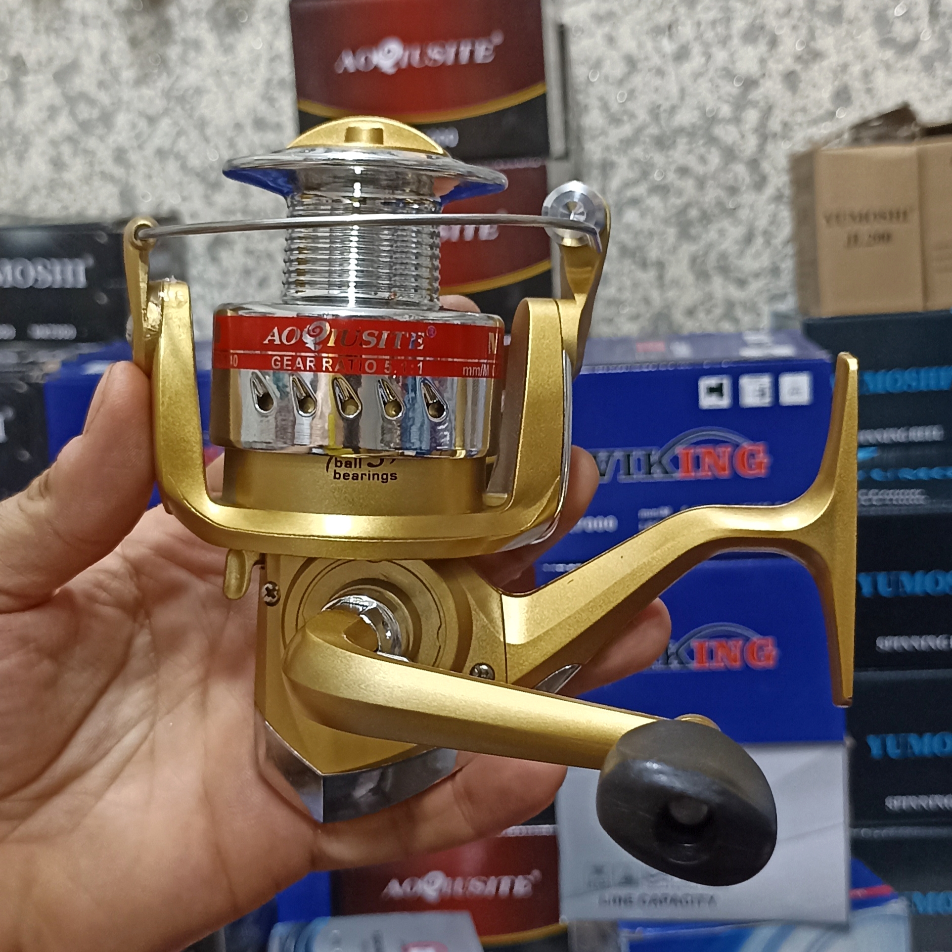 چرخ ماهیگیری 6000 برند اکوستی مدل NL gold 6000 مناسب برای چوب ماهیگیری لنسر ماهیگیری