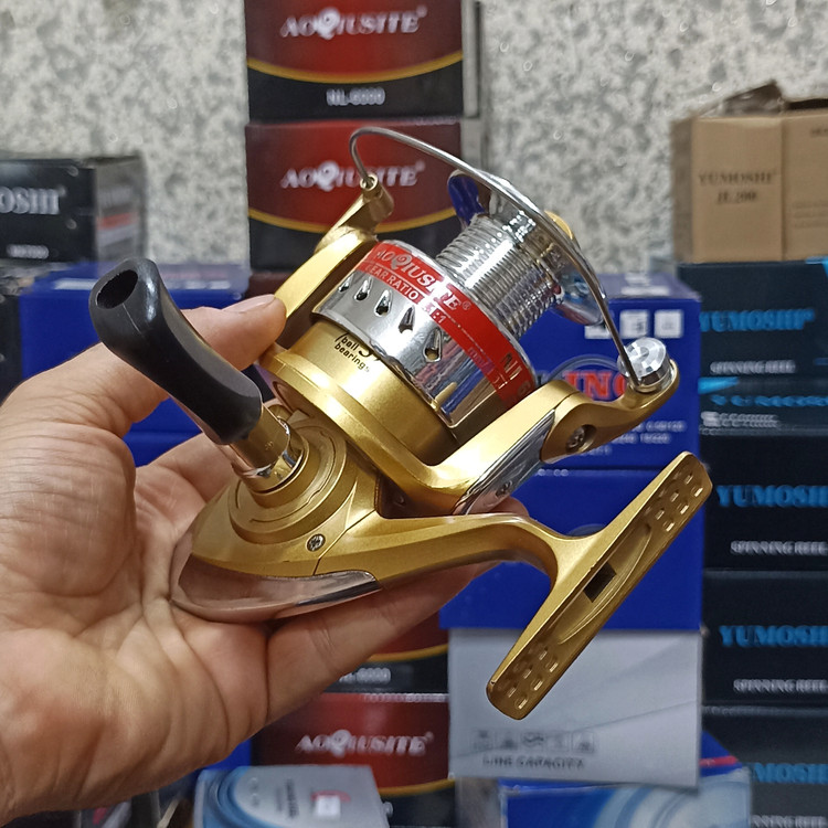 چرخ ماهیگیری 6000 برند اکوستی مدل NL gold 6000 مناسب برای چوب ماهیگیری لنسر ماهیگیری