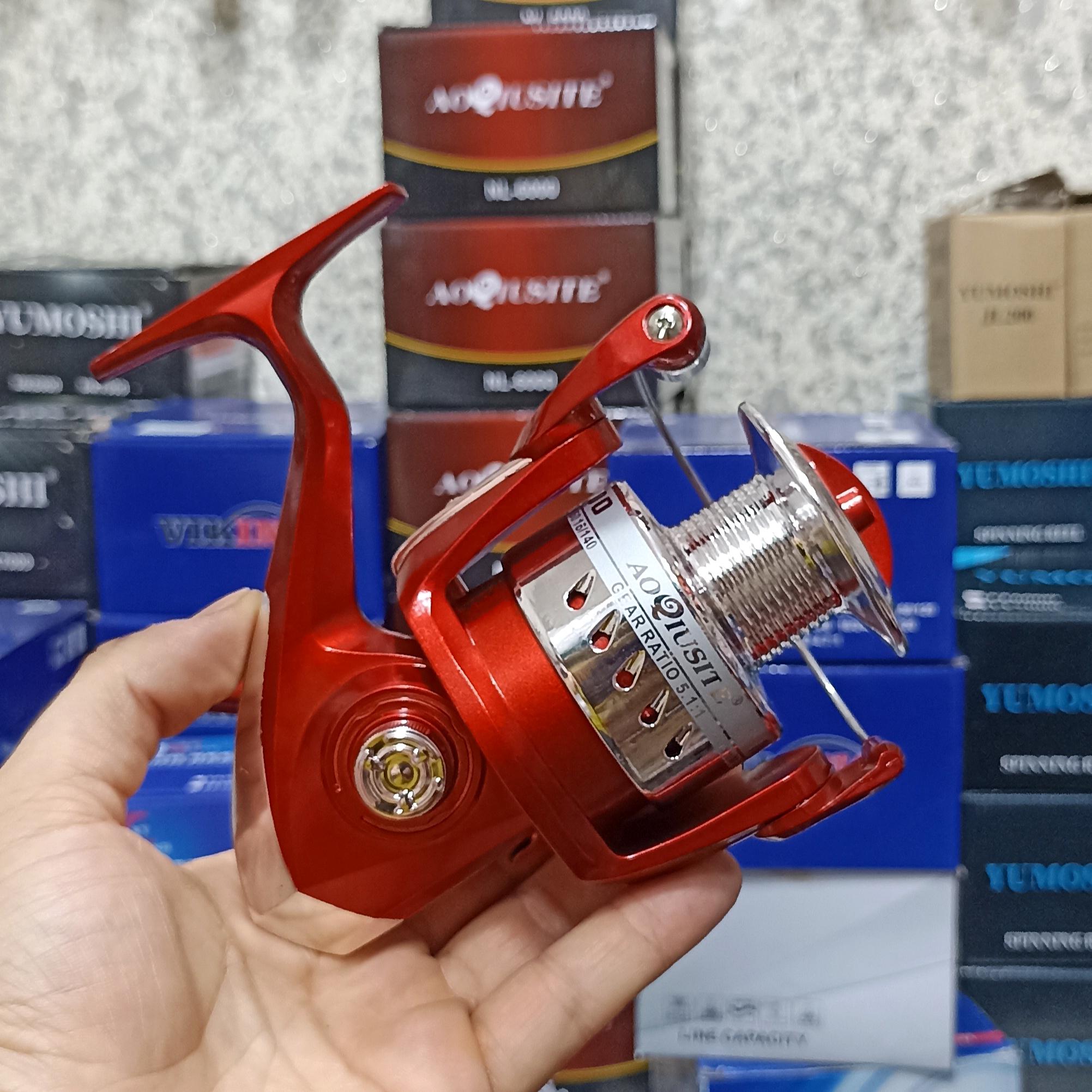چرخ ماهیگیری 6000 برند اکوستی مدل NL red 6000 مناسب برای چوب ماهیگیری لنسر ماهیگیری