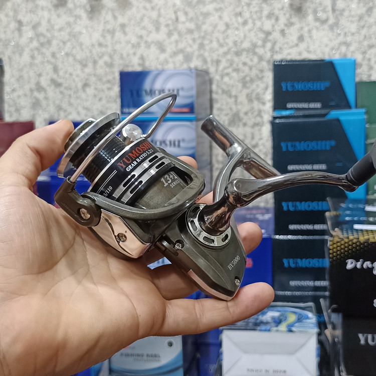 چرخ ماهیگیری 5000 برند یوموشی مدل BY 5000 تمام فلزی مناسب برای چوب ماهیگیری لنسر ماهیگیری