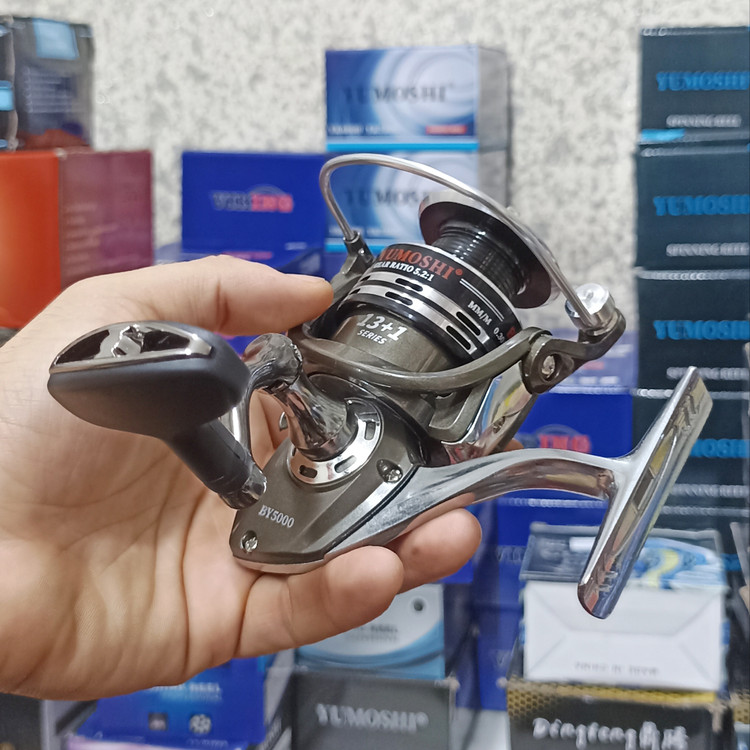 چرخ ماهیگیری 5000 برند یوموشی مدل BY 5000 تمام فلزی مناسب برای چوب ماهیگیری لنسر ماهیگیری