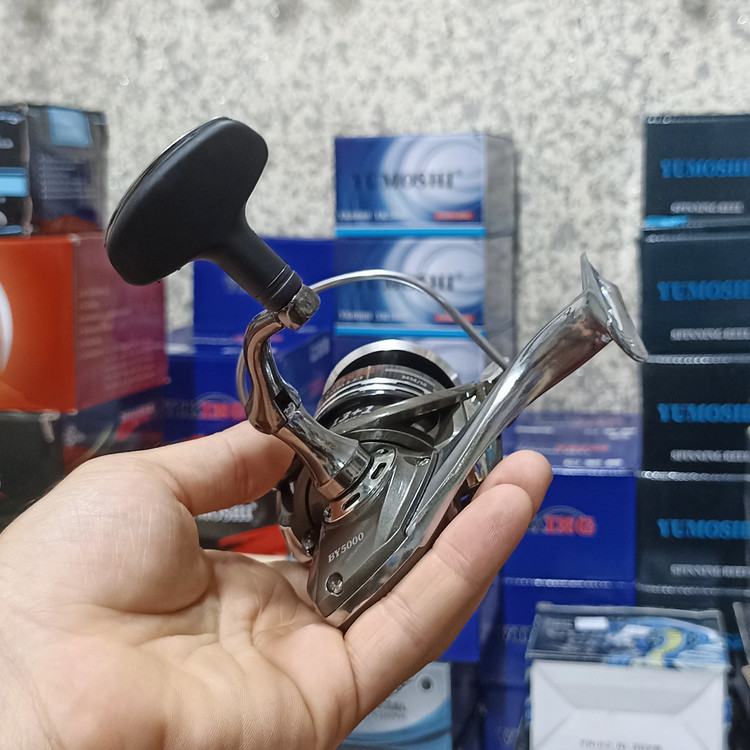 چرخ ماهیگیری 5000 برند یوموشی مدل BY 5000 تمام فلزی مناسب برای چوب ماهیگیری لنسر ماهیگیری