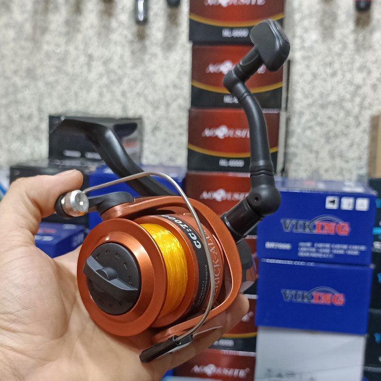 چرخ ماهیگیری 7000 برند پودریک به همراه نخ مدل CC7000 مناسب برای چوب ماهیگیری لنسر ماهیگیری